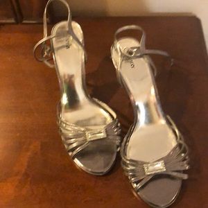 Strapping silver dressy heels